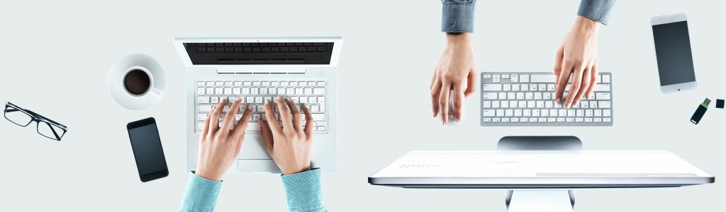 Draufsicht auf zwei Personen, die an verschiedenen Computern an demselben SIQUANDO Projekt arbeiten.