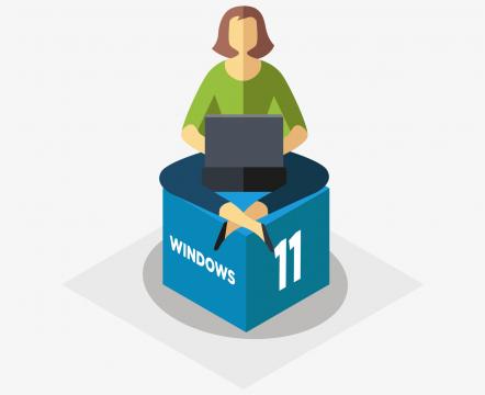 Symbolbild Frau auf Windows 11 Würfel.